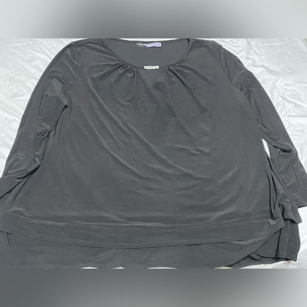 Long sleeve black top with bling on the top
